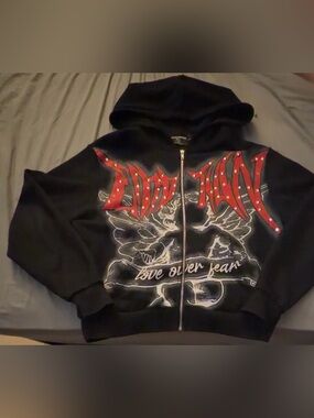 Mixed Emotions Black Zip-Up Hoodie with Red Studded Graphic